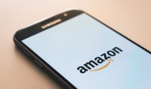 image of an iPhone with the Amazon logo on its screen